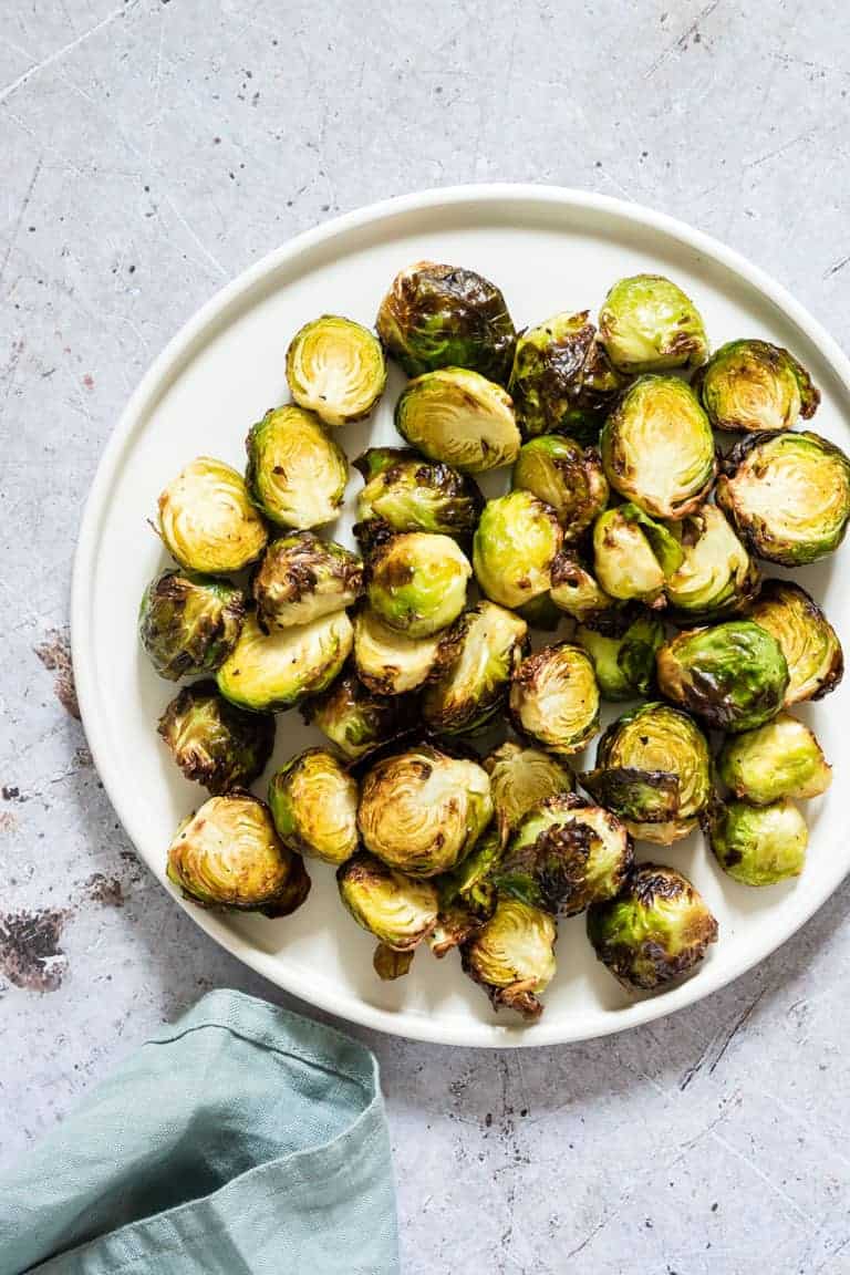 The best keto holiday side dishes for Thanksgiving or Christmas. So many yummy and easy side dishes including green beans, stuffing, brussels sprouts, gluten free, and vegan. 