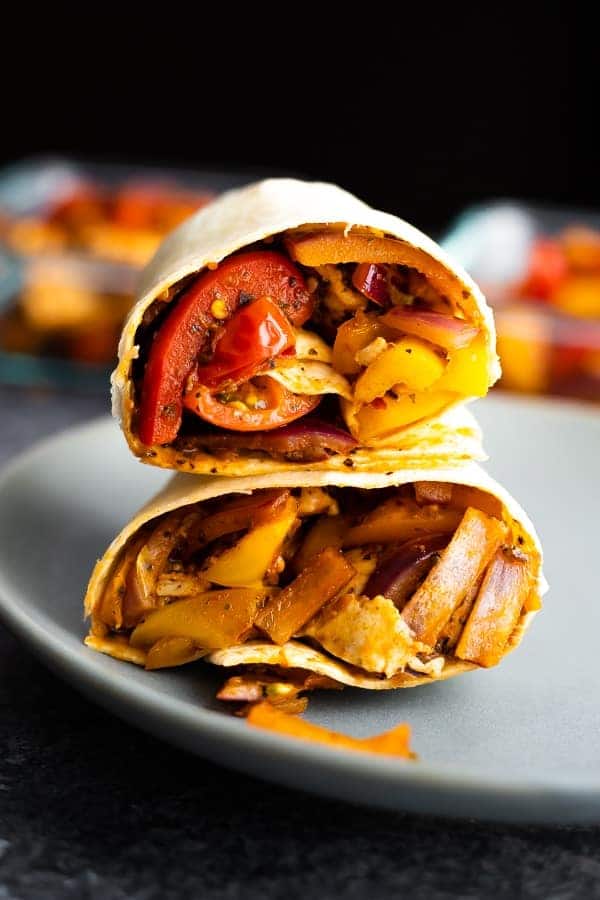 This cajun chicken wrap recipe is perfect for meal prep! Ready in under 20 minutes, packed full of veggies, and SO delicious for lunches or dinners!