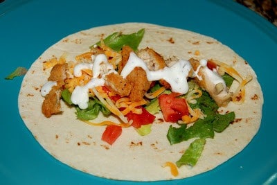 Your kids will love these wraps made with guacamole, lettuce, tomato
cheese. chicken nuggets, and ranch dressing. 