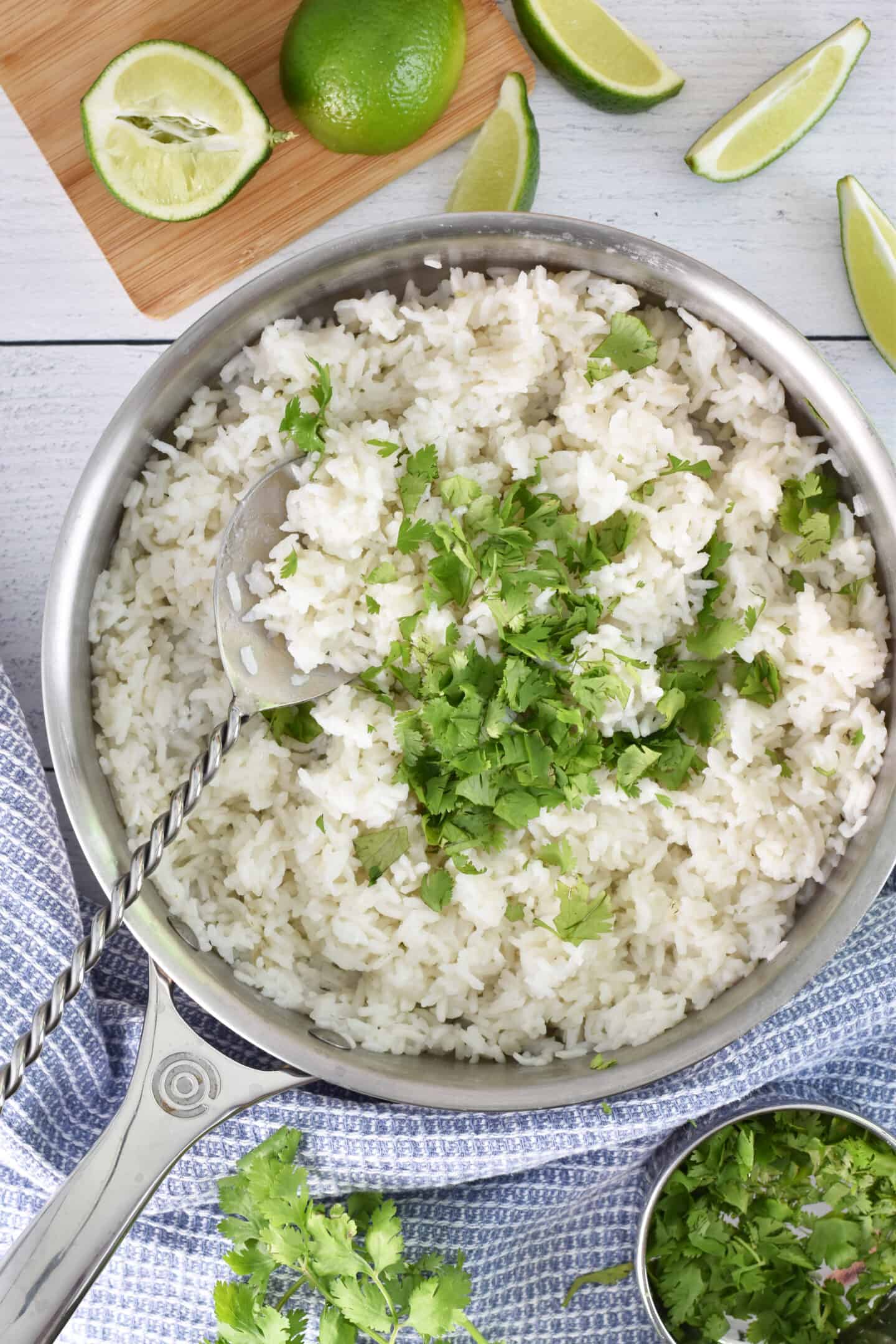 Pot of rice covered with cilantro. 