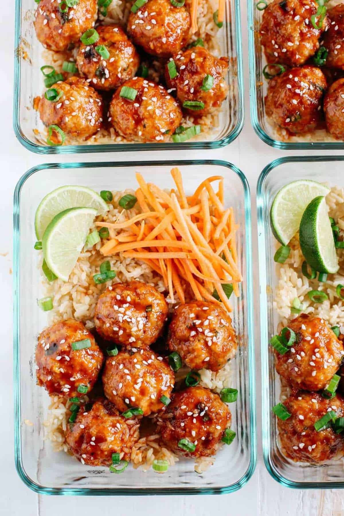 Honey sriracha glazed meatballs over rice in meal prep containers. 