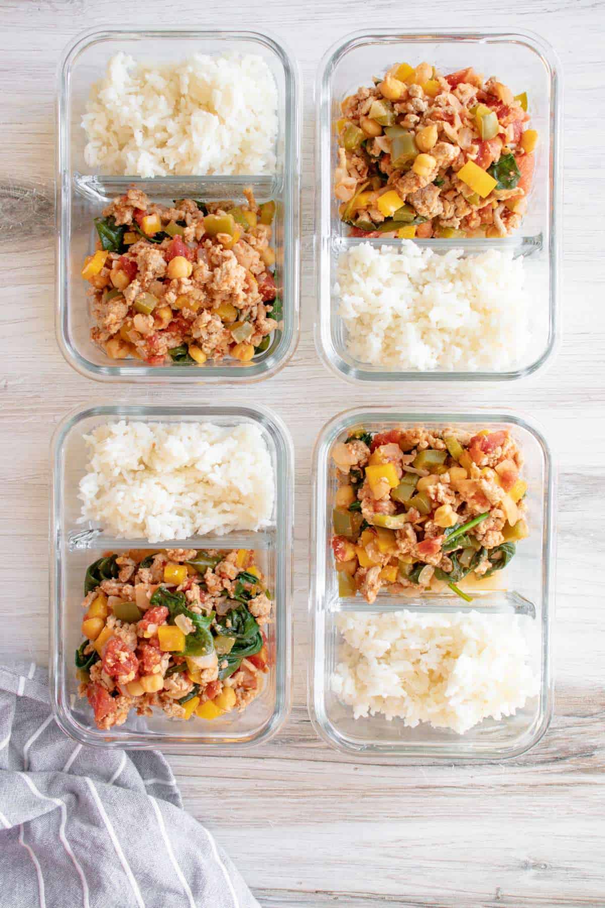 Ground turkey and rice in meal prep containers. 
