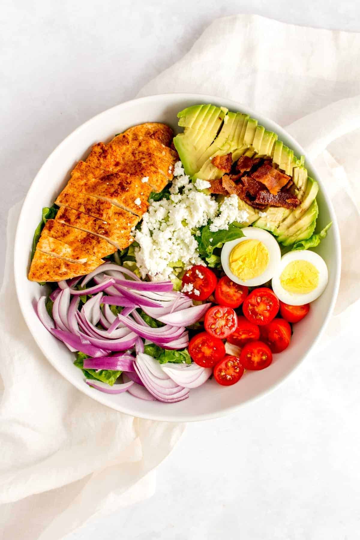 Chicken cobb salad in a bowl. 