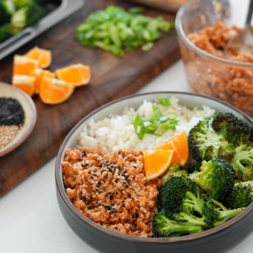Orange chicken, broccoli, and rice blend in bowl.