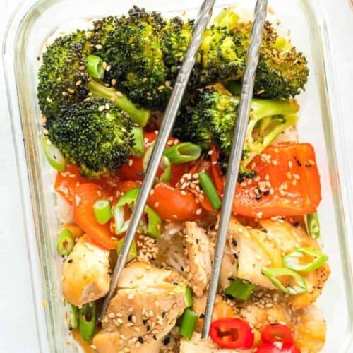 Chicken and veggies in a glass meal prep container.