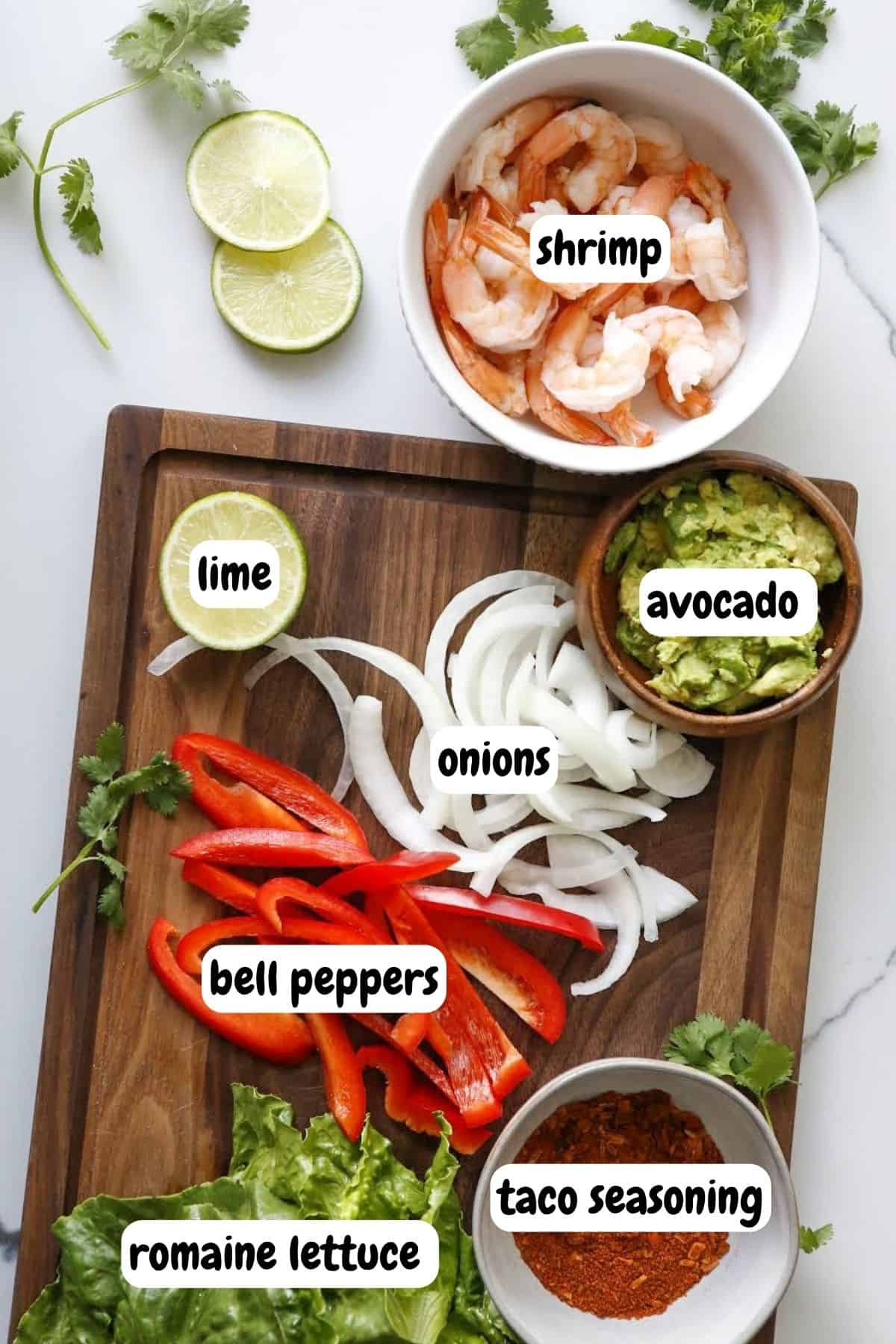 Ingredients for shrimp fajita bowls in individual bowls. 
