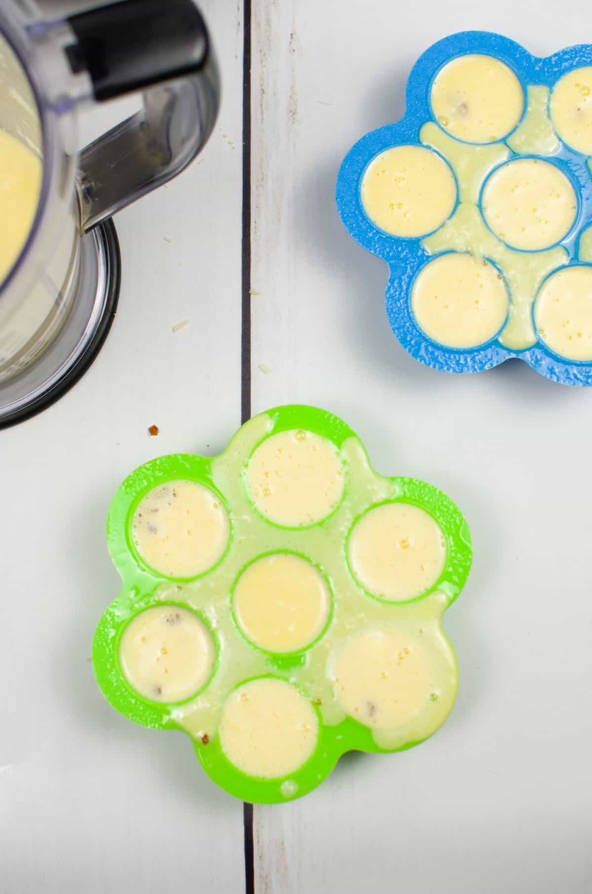 Egg mixture poured into egg molds. 