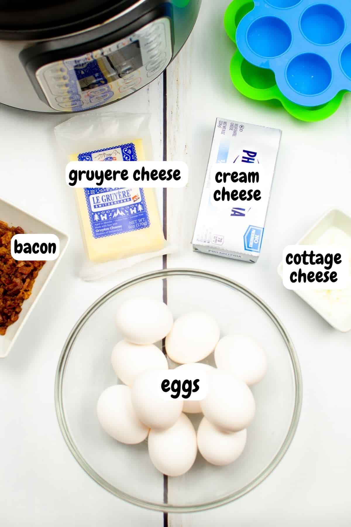 Ingredients for Bacon and Gruyere Egg Bites in individual bowls. 
