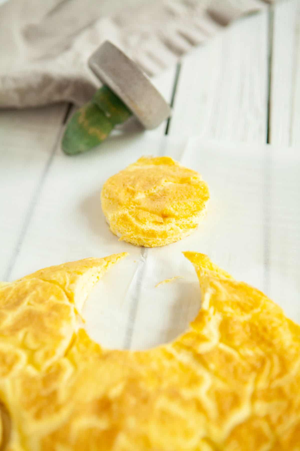Eggs being cut with a biscuit cutter. 
