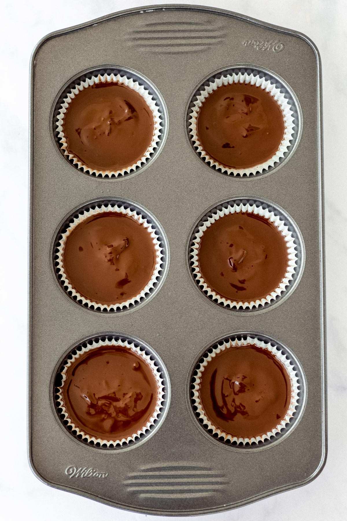 Peanut butter cups ready to go into the freezer. 