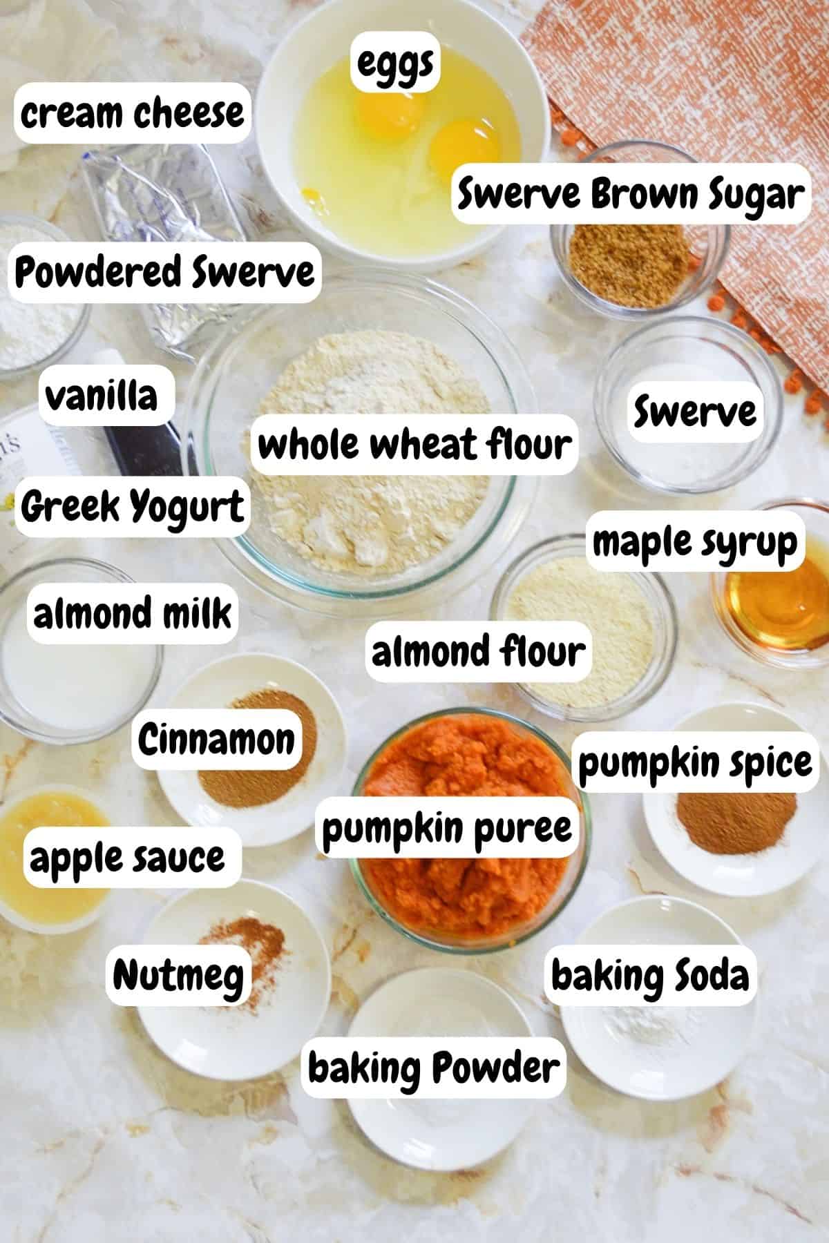 Ingredient for pumpkin bar with cream cheese frosting in individual containers. 