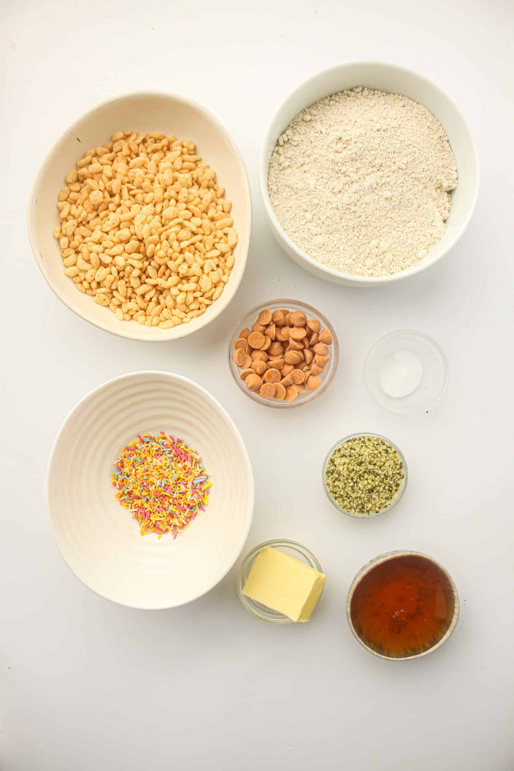 Oat flour, hemp seeds, honey, butter, salt, butterscotch chips, sprinkles, and rice crisps for energy balls.