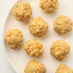 After school energy balls with butterscotch chips and colorful sprinkles arranged on a plate.