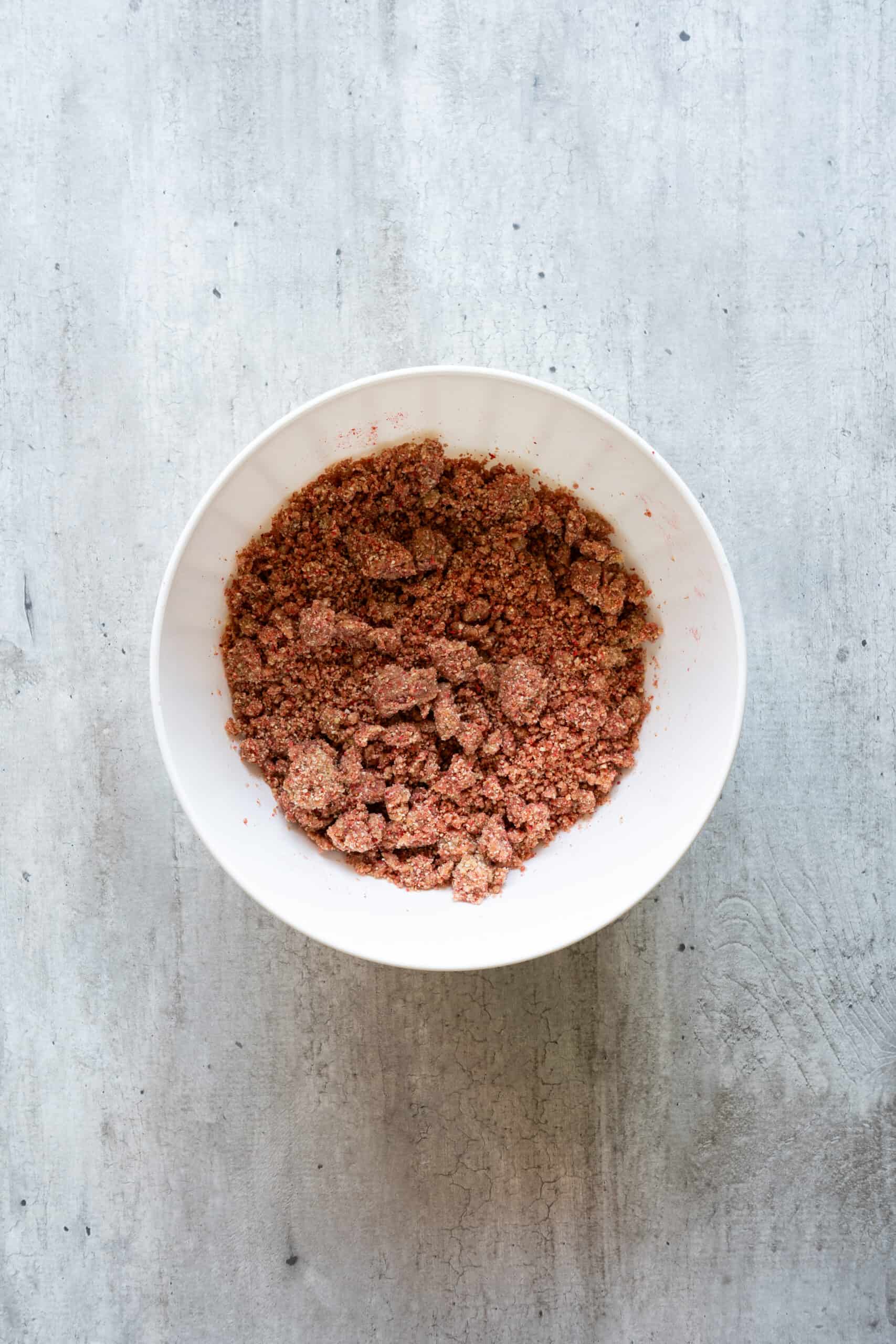 Freeze-dried strawberries incorporated into the energy bite dough.