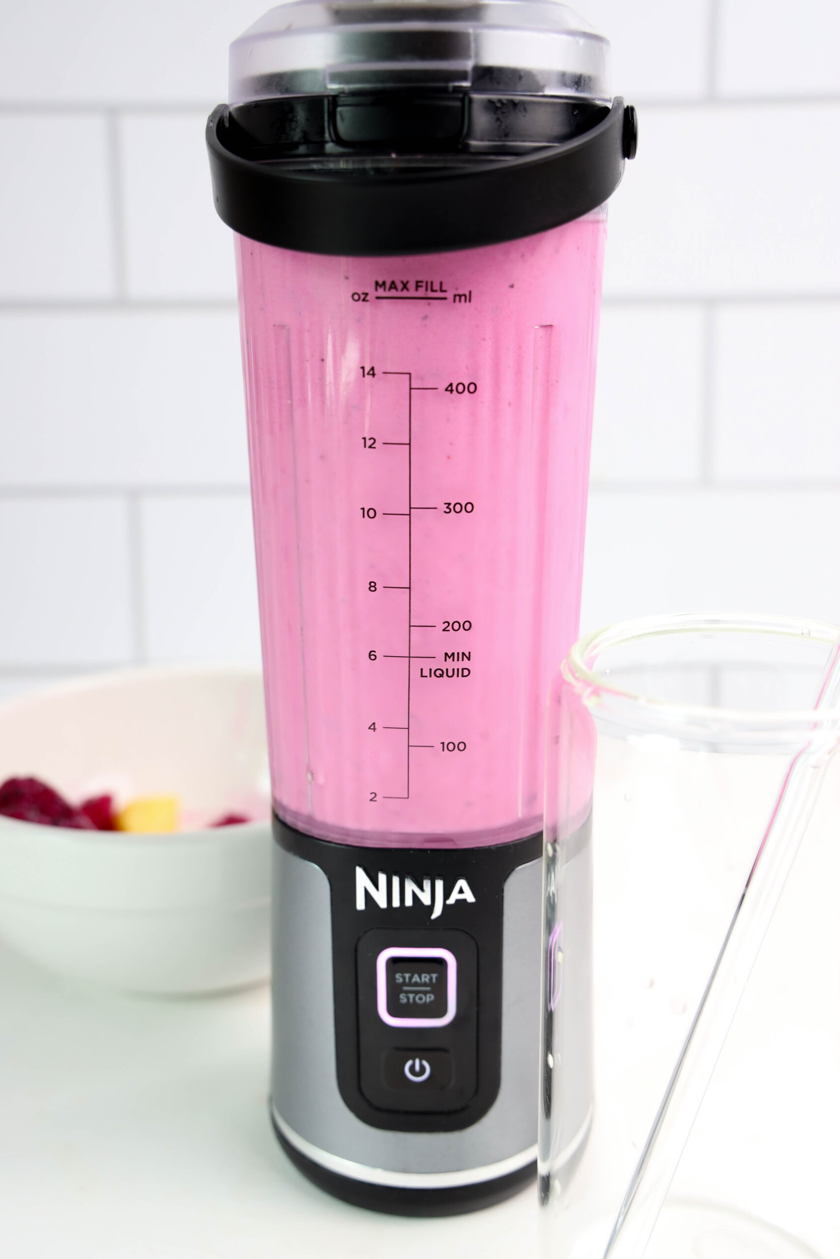Bright pink dragonfruit smoothie blended until smooth and creamy.