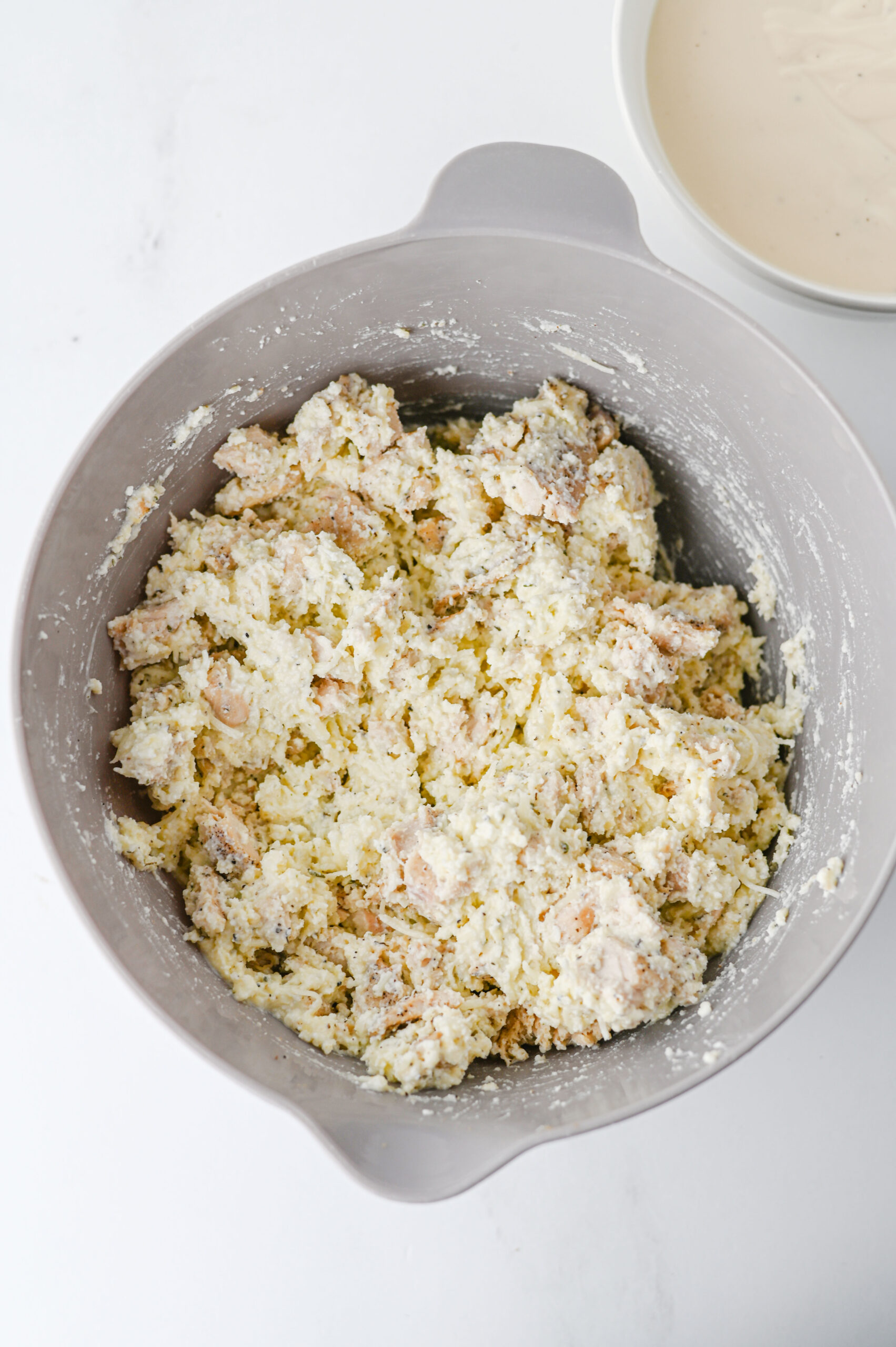 Cooked chicken folded into the ricotta cheese filling.