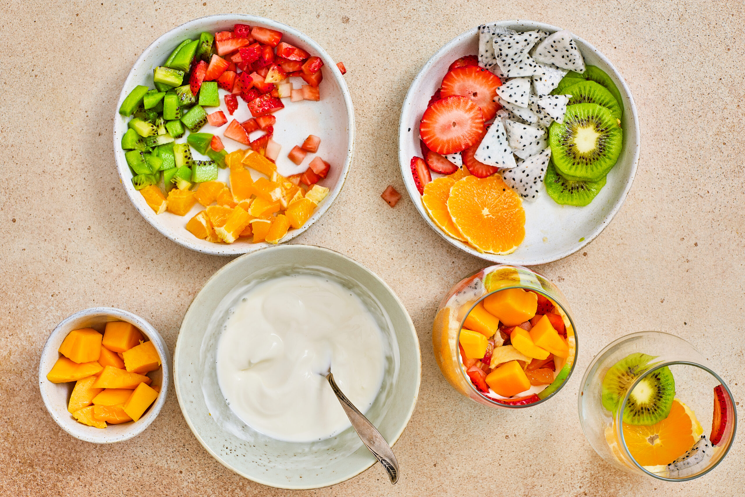 Fruit and yogurt layers repeated inside a serving glass.