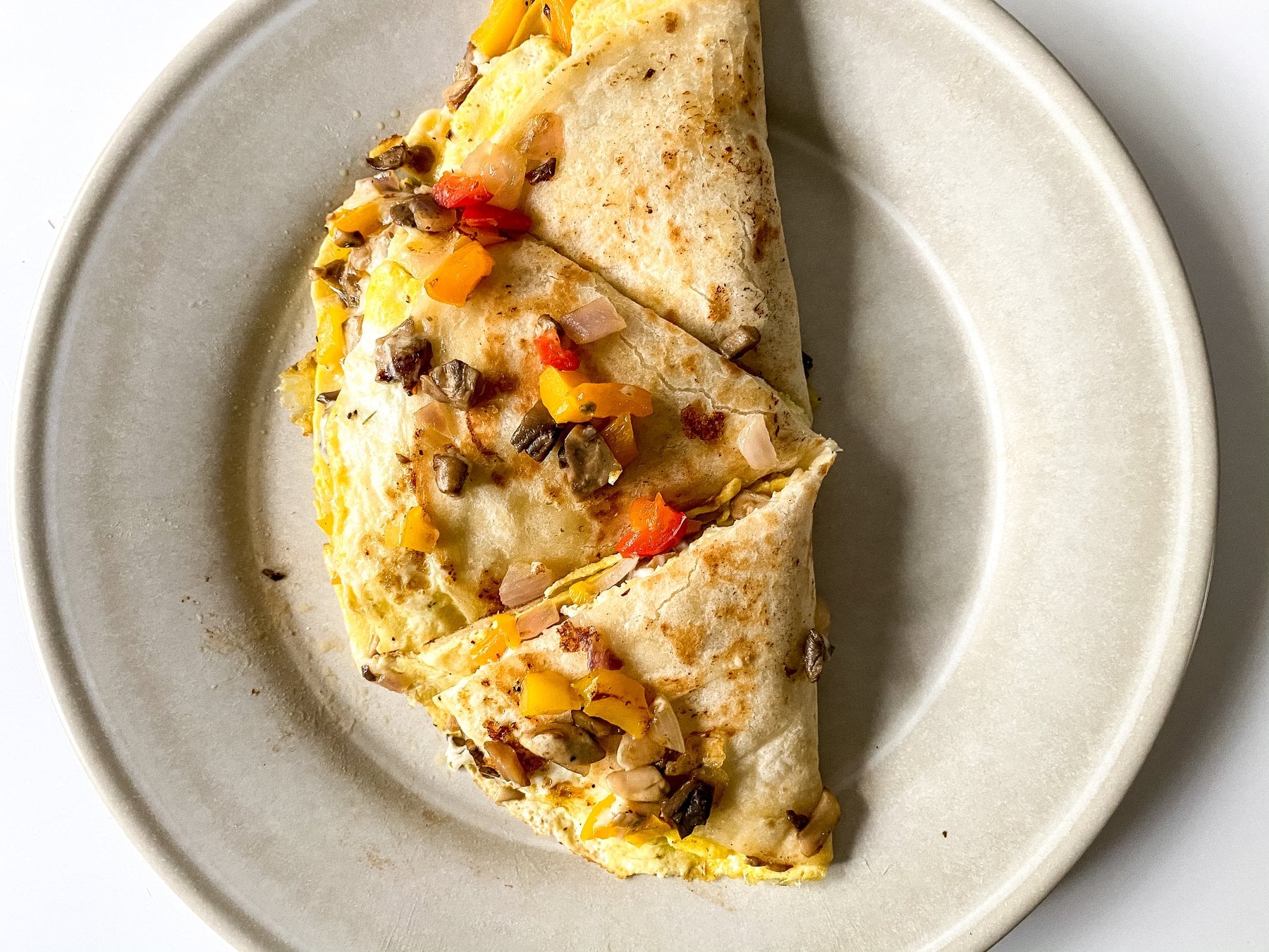 veggie breakfast quesadilla on a plate