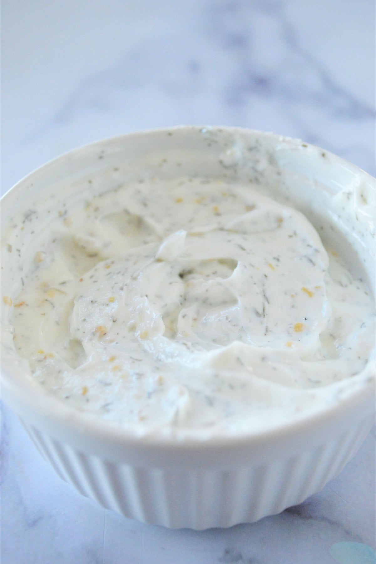 stirred Greek yogurt coleslaw dressing with dill