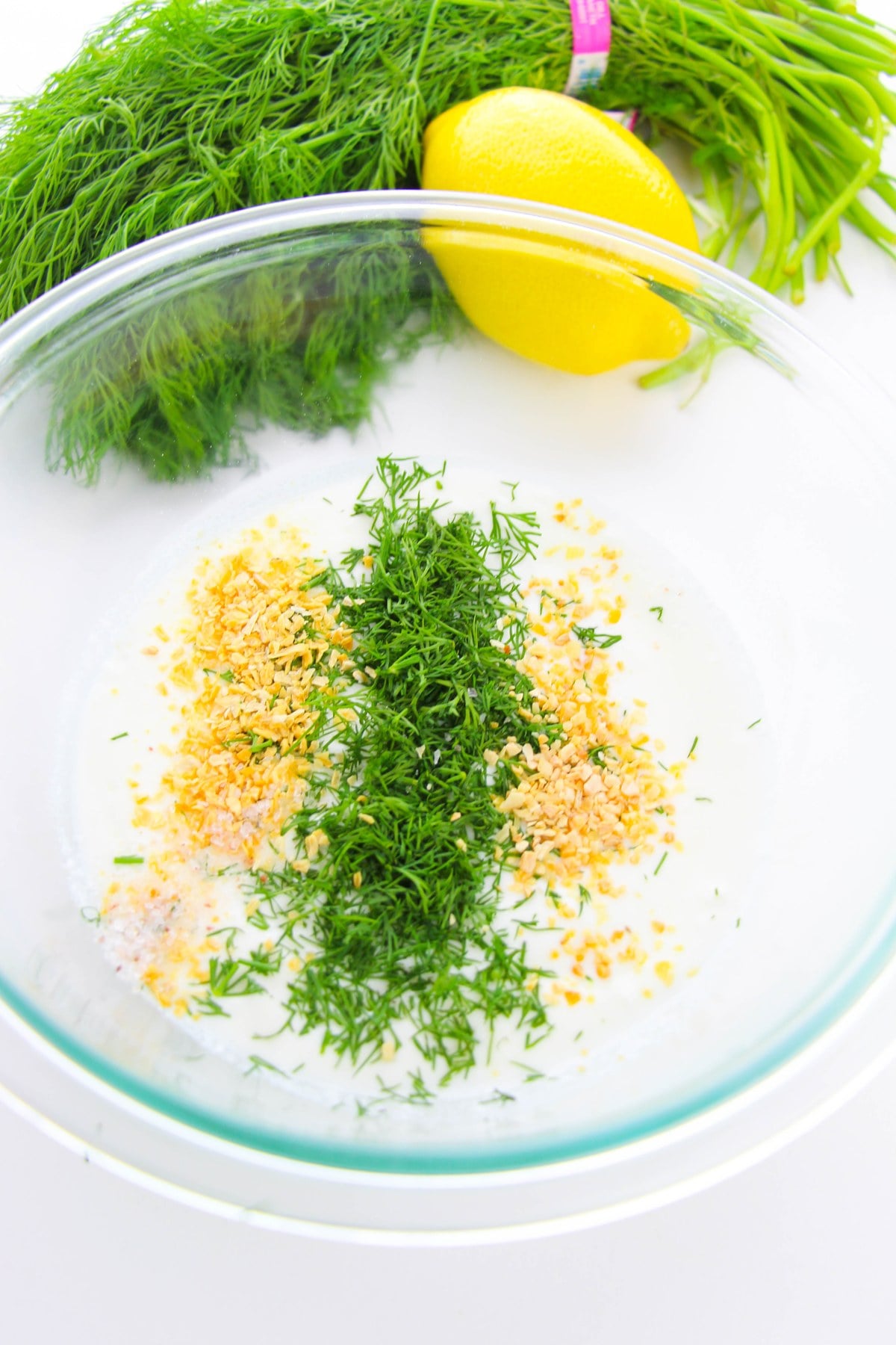 fresh dill, dried garlic and onion flakes added to Greek yogurt