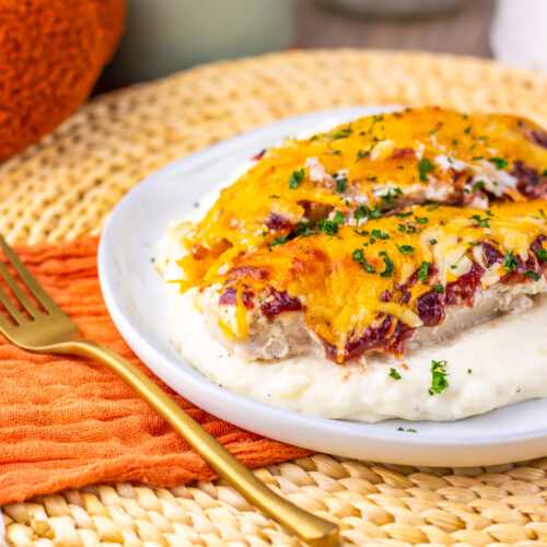 Cranberry cream cheese chicken bake served over mashed potatoes.