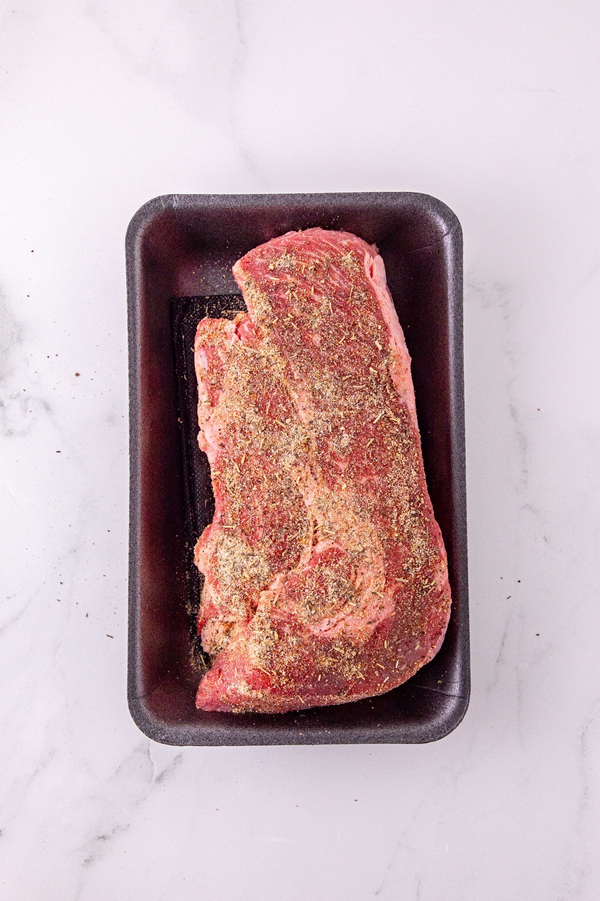 chuck roast rubbed with garlic and herb seasoning