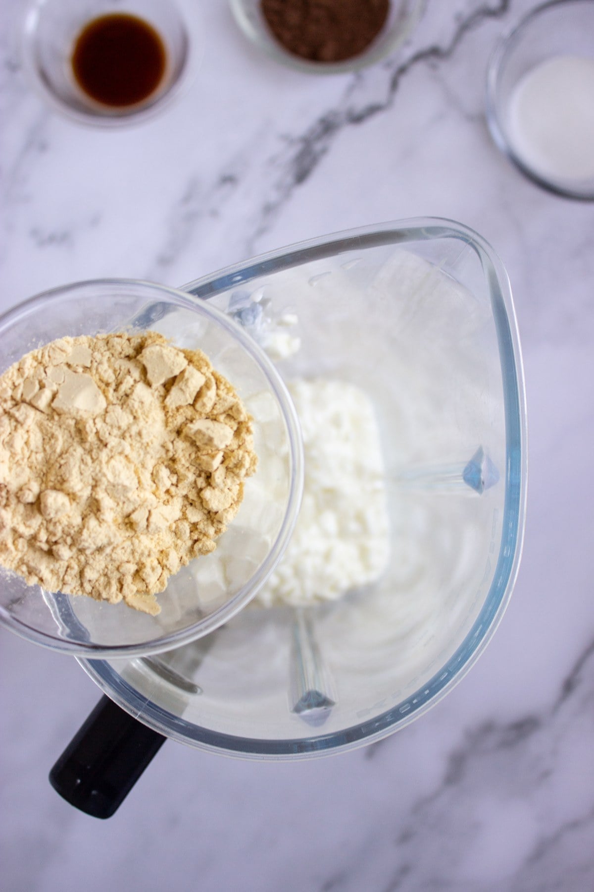 Peanut butter protein powder added to the blender.