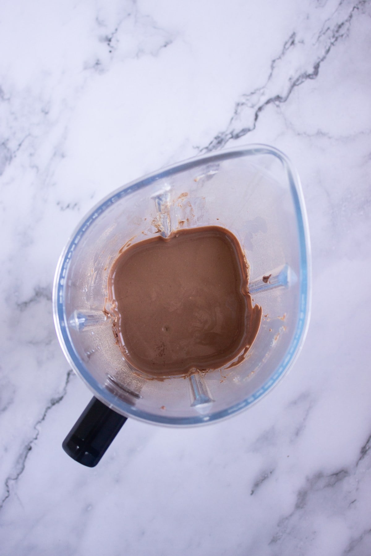 Smooth chocolate peanut butter cottage cheese pudding in the blender.